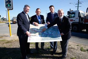 Finance Minister Mathias Cormann, Prime Minster Tony Abbott, Canning Liberal candidate Andrew Hastie and City of Armadale mayor Henry Zelones discuss the Armadale Road. 