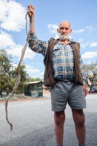 Mr Mann with the snakeskin he found at his son’s Byford home. Photograph — Matt Devlin
