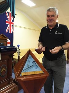 Chuck Frame with the symbolic tools of the Freemasons. Photograph — Robyn Molloy.