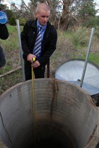 Senior constable Tom Grieve from Armadale Detective at the well where the 19-year-old was found. Photograph – Matt Devlin.