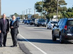 Cockburn mayor Logan Howlett and Armadale mayor Henry Zelones at the Nicholson Road intersection with traffic banking up 800 metres either side of Armadale Road. Photograph — Matt Devlin.