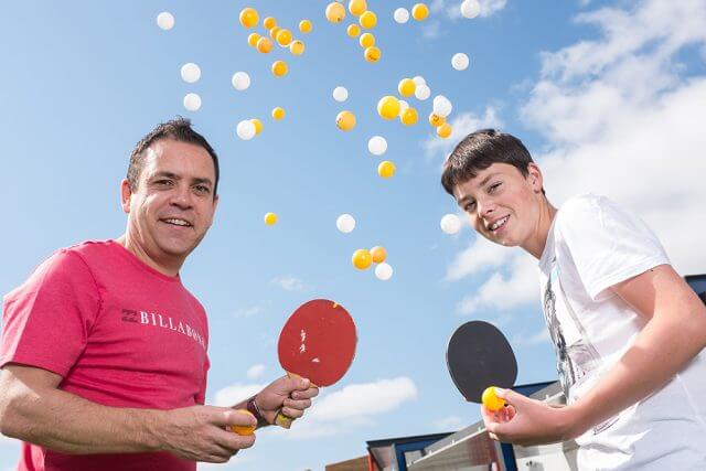 Ping pong-a-thon organiser Martin Dodge and participant Tiger Ross will be playing table tennis this weekend to raise funds to help stop international human trafficking. Photograph — Matt Devlin.