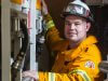 Damon Barrett is living out his dream to help the community by becoming a volunteer firefighter. Photograph — Matt Devlin.
