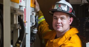 Damon Barrett is living out his dream to help the community by becoming a volunteer firefighter. Photograph — Matt Devlin.