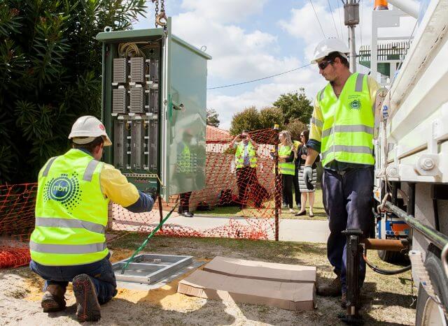 Stuart Graham and Matt Reynolds installed the City of Gosnells’ first NBN node in Langford last week. Photograph — Matt Devlin.