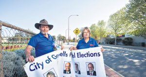 City of Gosnells mayor Dave Griffiths and his wife and campaign manager Jan were forced to replace about $1000 worth of signage after it was tampered with last week. Photograph — Matt Devlin.