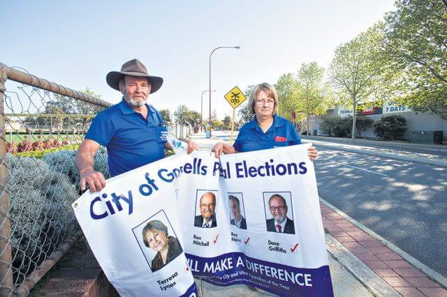 City of Gosnells mayor Dave Griffiths and his wife and campaign manager Jan were forced to replace about $1000 worth of signage after it was tampered with last week. Photograph — Matt Devlin.