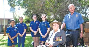 Gosnells primary school students Kunal Panchal, Thaw Maung, Chloe La Roche and Olivia Wilson met with WWII veteran Alf Jenaway and Kenwick rotary club project coordinator Steve Weychan. Photograph — Matt Devlin.