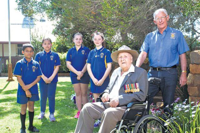 Gosnells primary school students Kunal Panchal, Thaw Maung, Chloe La Roche and Olivia Wilson met with WWII veteran Alf Jenaway and Kenwick rotary club project coordinator Steve Weychan. Photograph — Matt Devlin.