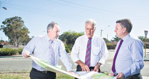 Armadale chief executive Ray Tame, Member for Canning Don Randall and assistant minister for infrastructure and regional development Jamie Briggs discussing the $1.5 million of black spot projects announced for the City of Armadale. Photograph — Matt Devlin.