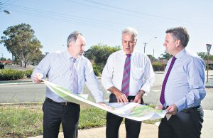 Armadale chief executive Ray Tame, Member for Canning Don Randall and assistant minister for infrastructure and regional development Jamie Briggs discussing the $1.5 million of black spot projects announced for the City of Armadale. Photograph — Matt Devlin.