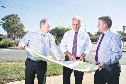 Armadale chief executive Ray Tame, Member for Canning Don Randall and assistant minister for infrastructure and regional development Jamie Briggs discussing the $1.5 million of black spot projects announced for the City of Armadale. Photograph — Matt Devlin.