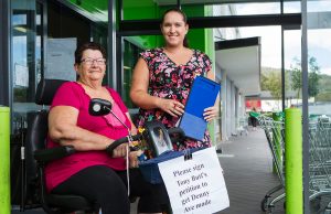 Camillo residents Gwen Singh and Laura Shockthorap will collect signatures for a petition to fix the issues at Denny Avenue this Saturday. Photograph — Matt Devlin.