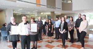 City of Canning chief executive Lyn Russell and mayor Paul Ng with the award winning customer service centre team. Photograph — Matt Devlin.