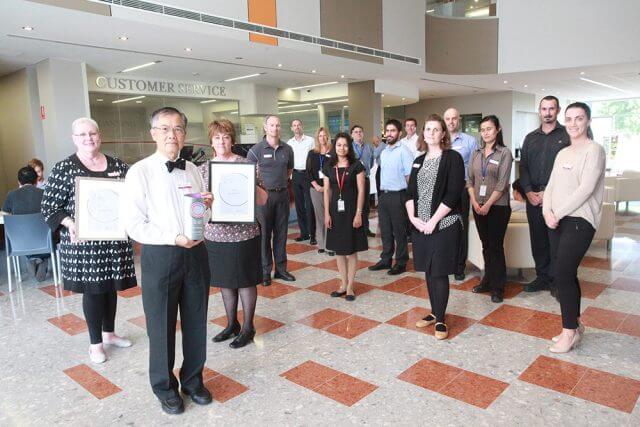 City of Canning chief executive Lyn Russell and mayor Paul Ng with the award winning customer service centre team. Photograph — Matt Devlin.