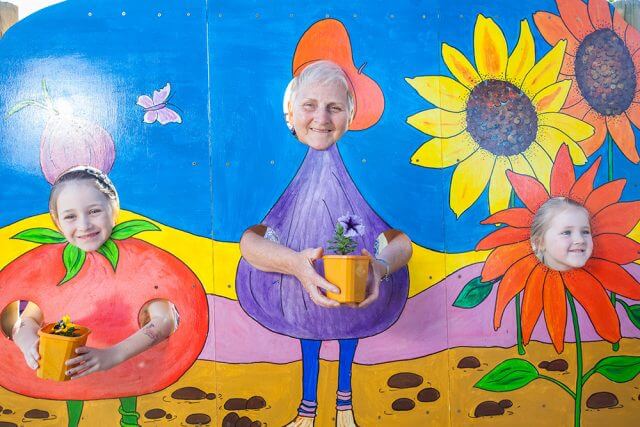 Tegan Carter, Jan Davis and Kayla Carter add some fun to the festival. Photograph — Matt Devlin.