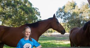 Georgia Lowry credits her relationship with her horses for getting her through difficult times. Photograph — Matt Devlin.