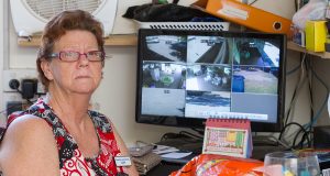 Serpentine Jarrahdale RSL op shop volunteer Judy Petrie with CCTV footage showing the outside of the shop’s premises. Photograph — Matt Devlin.