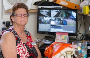 Serpentine Jarrahdale RSL op shop volunteer Judy Petrie with CCTV footage showing the outside of the shop’s premises. Photograph — Matt Devlin.