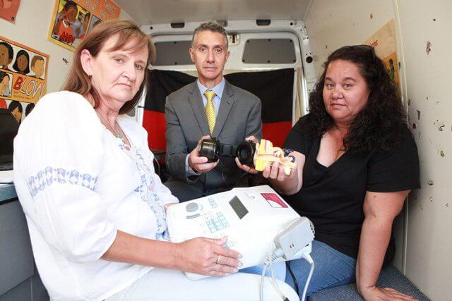 Ear bus ear screeners Jane Matthews and Tania Harris and Member for Armadale Tony Buti are worried ear health in indigenous children will be compromised. Photograph — Matt Devlin.