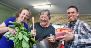 Kylie Gwilym, Heather Stewart-Johnson and David James are looking for some help in their Friday night kitchen. The kitchen has opened up weekly because of an increased demand. Photograph — Matt Devlin.