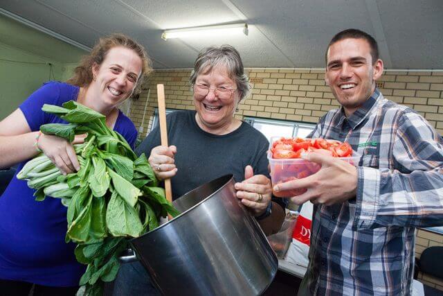 Kylie Gwilym, Heather Stewart-Johnson and David James are looking for some help in their Friday night kitchen. The kitchen has opened up weekly because of an increased demand. Photograph — Matt Devlin.