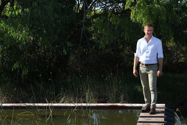 Environment Minister Albert Jacob at the Wharf Street Wetland. Photograph — Hamish Hastie.