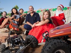 Clare Campbell, Ruby, Jade and Darren Duncan, Sarah Upton and Jamie Campbell with the RC rock crawlers. Photograph — Matt Devlin.