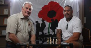 Armadale RSL president Ken Hepburn with Seville Grove artist Gracey and his piece highlighting mental health issues in soldiers. Photograph — Matt Devlin.