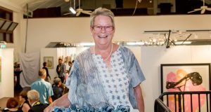 Trudi Pollard with her award winning piece Indigo Scrolls. Photograph — Kelly Pilgrim-Byrne.