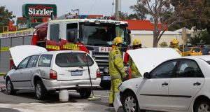 Firefighters cleaning up the fuel leak from the Falcon. Photograph – Matt Devlin.