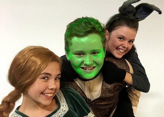 Princess Fiona (Stephanie Shaw), Shrek (Ashley Garner) and Donkey (Saoirse Gerrish) and in Shrek Junior – The Musical.