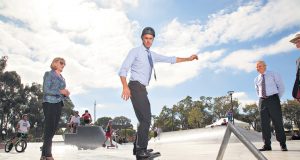 Youth Minister Tony Simpson tries out the skate plaza in Beckenham on Wednesday afternoon while City of Gosnells director of infrastructure Dave Harris watches on in amazement at Mr Simpson’s skills. Photograph — Matt Devlin.