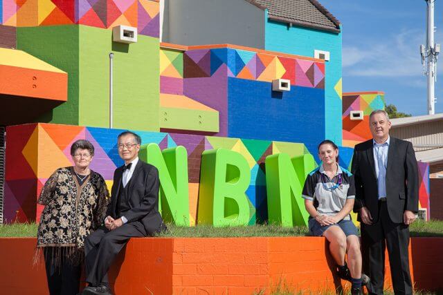 Langford resident Zora Elliss, City of Canning mayor Paul Ng, Telstra technician Rebecca Dhu and Telstra area general manager Boyd Brown at the NBN launch outside the Cannington exchange in April. Photograph — Matt Devlin.