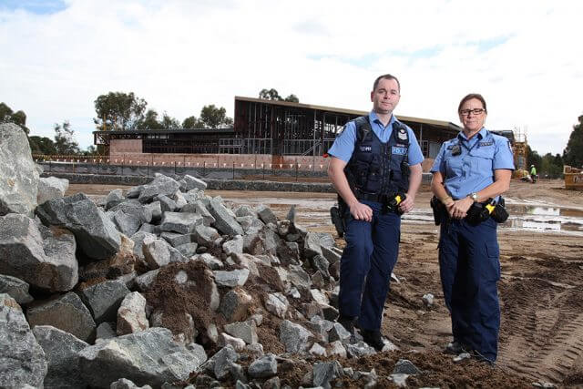 Acting senior sergeant Bron Umbras and first class constable Colleen Grey check the progress at the new Mundijong police station. Photograph — Matt Devlin.