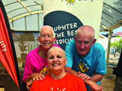 Volunteers shave for kids