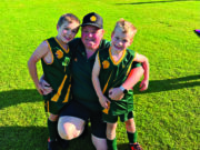 Volunteer honoured for years of helping young footballers