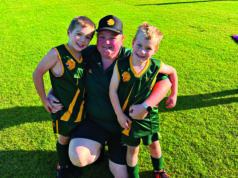 Volunteer honoured for years of helping young footballers